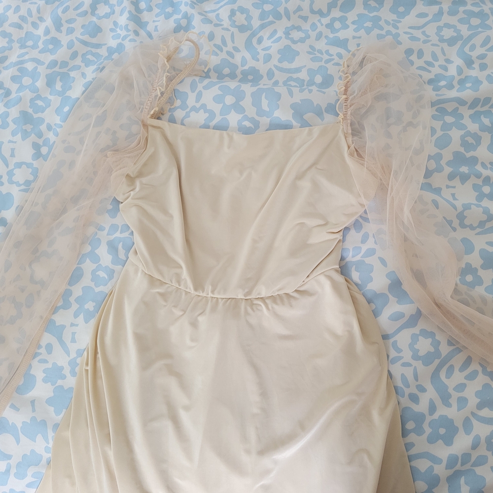 Elegant Cream Dress with Sheer Sleeves